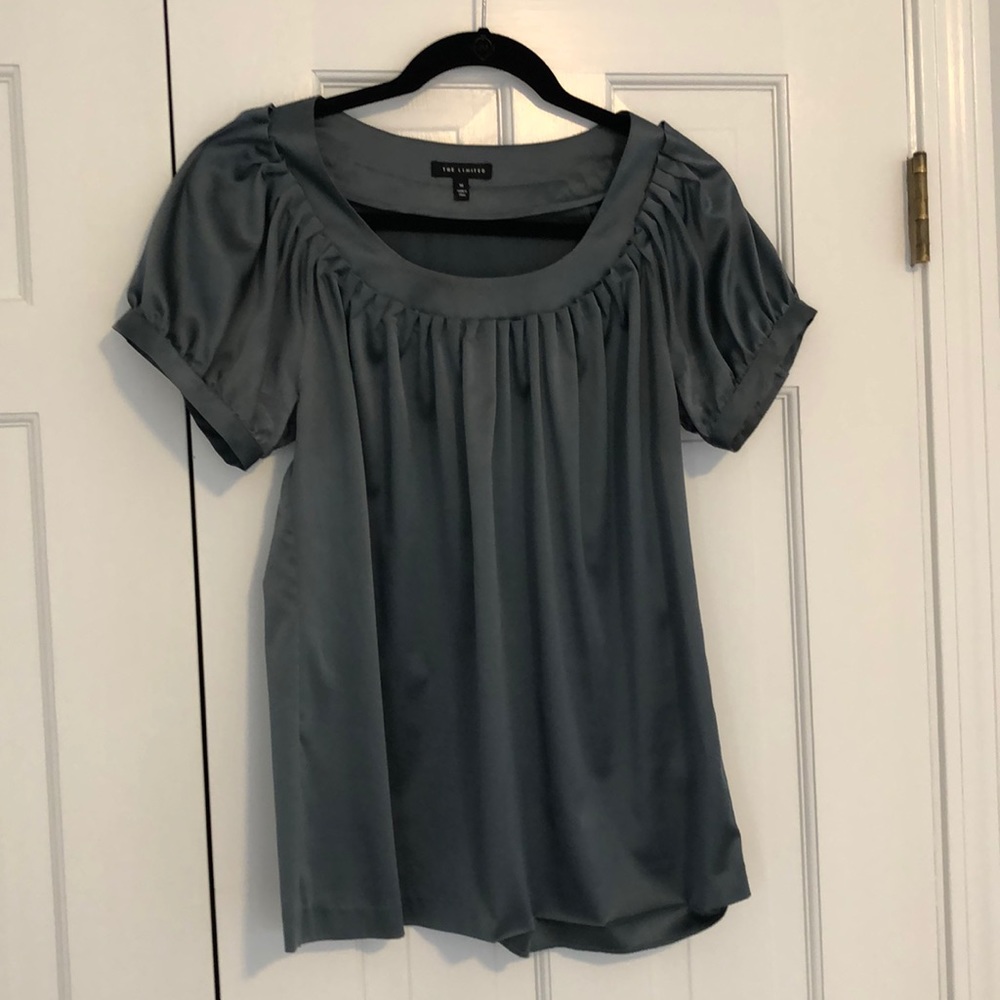 Green blouse.